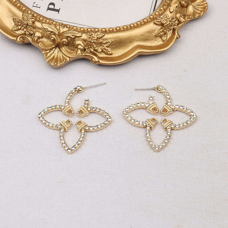 New Hollow Out with Dias Four-Leaf Clover Elegant Fashion Versatile Earrings High-End Exquisite Ear Jewelry
