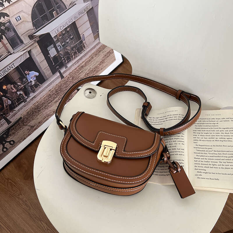 DHEssentials 2025 Autumn New Korean Ins Niche Color Block Saddle Bag Women's Retro Versatile Underarm Small Crossbody Bag PU Brown Black