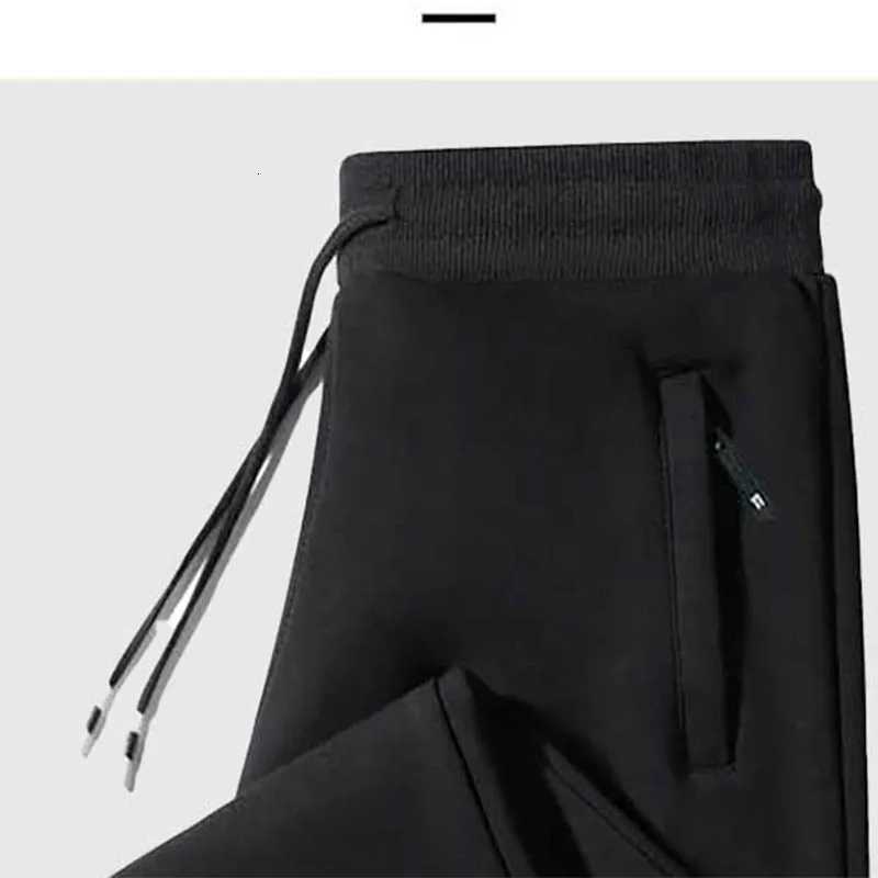 Solid color corded sweatpants mens casual pants fashion sports pants loose fashion spring and autumn plus size pantsXJ250904