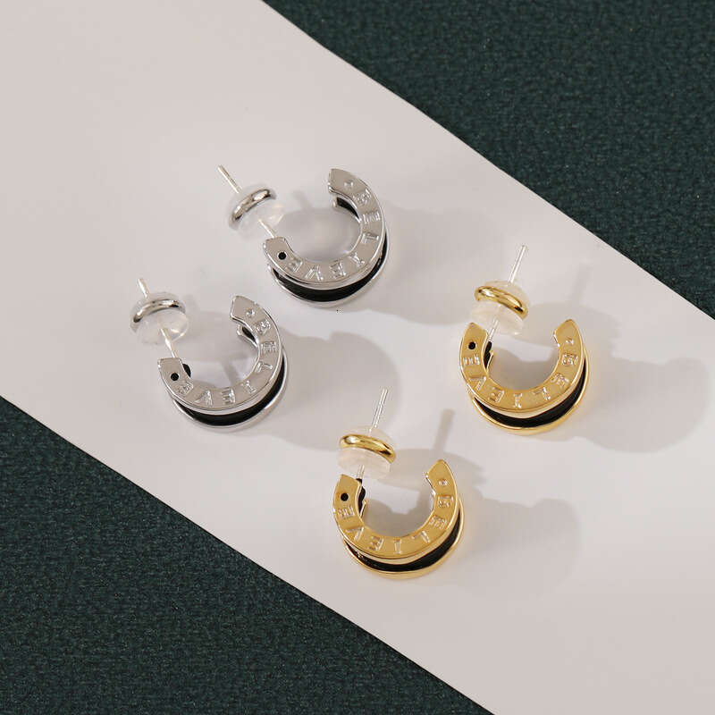 DH collections New Arrival! Women's Stylish Black Tweed - inspired Ear Clips & Earrings. Exude a touch of luxury with this trendy design.