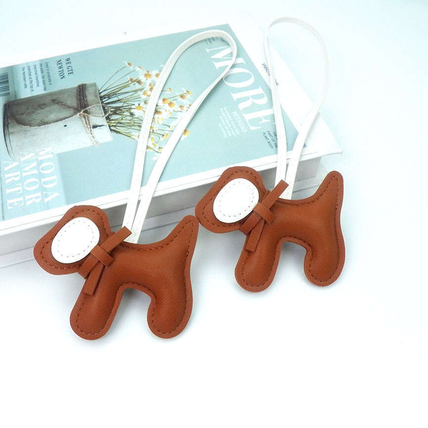 DHEssentials 2025 Spring Leather Bow Dog Pendant Cartoon Bag Charm PU Keychain Car Hanger White Customizable