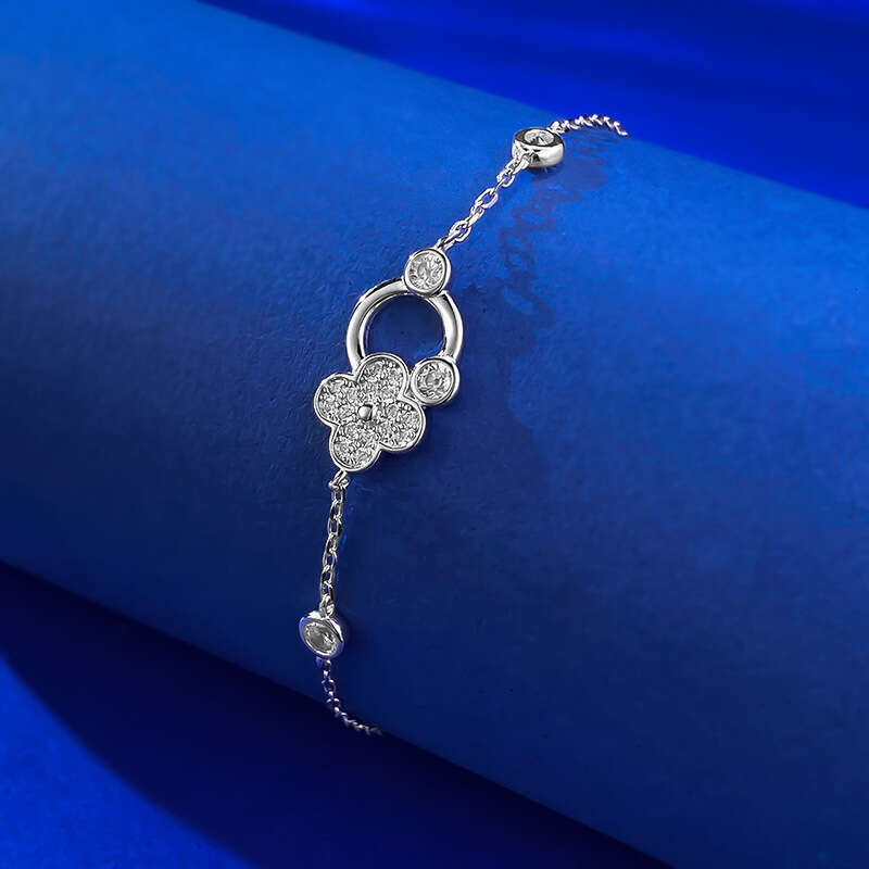 DH collections 925 Sterling Silver Lucky Four - leaf Clover Bracelet. This delicate and luxurious bracelet features trendy elements like row - set dia
