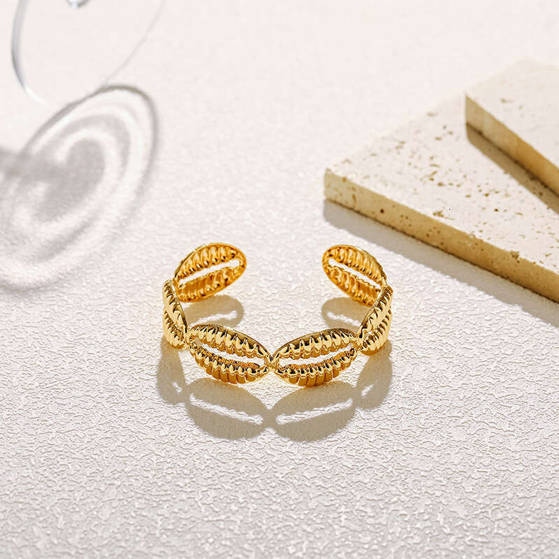 DH collections Vintage - style 18K Gold - plated Copper Bracelet with Shell Design. This bracelet in a geometric shape offers a retro and laid - back 