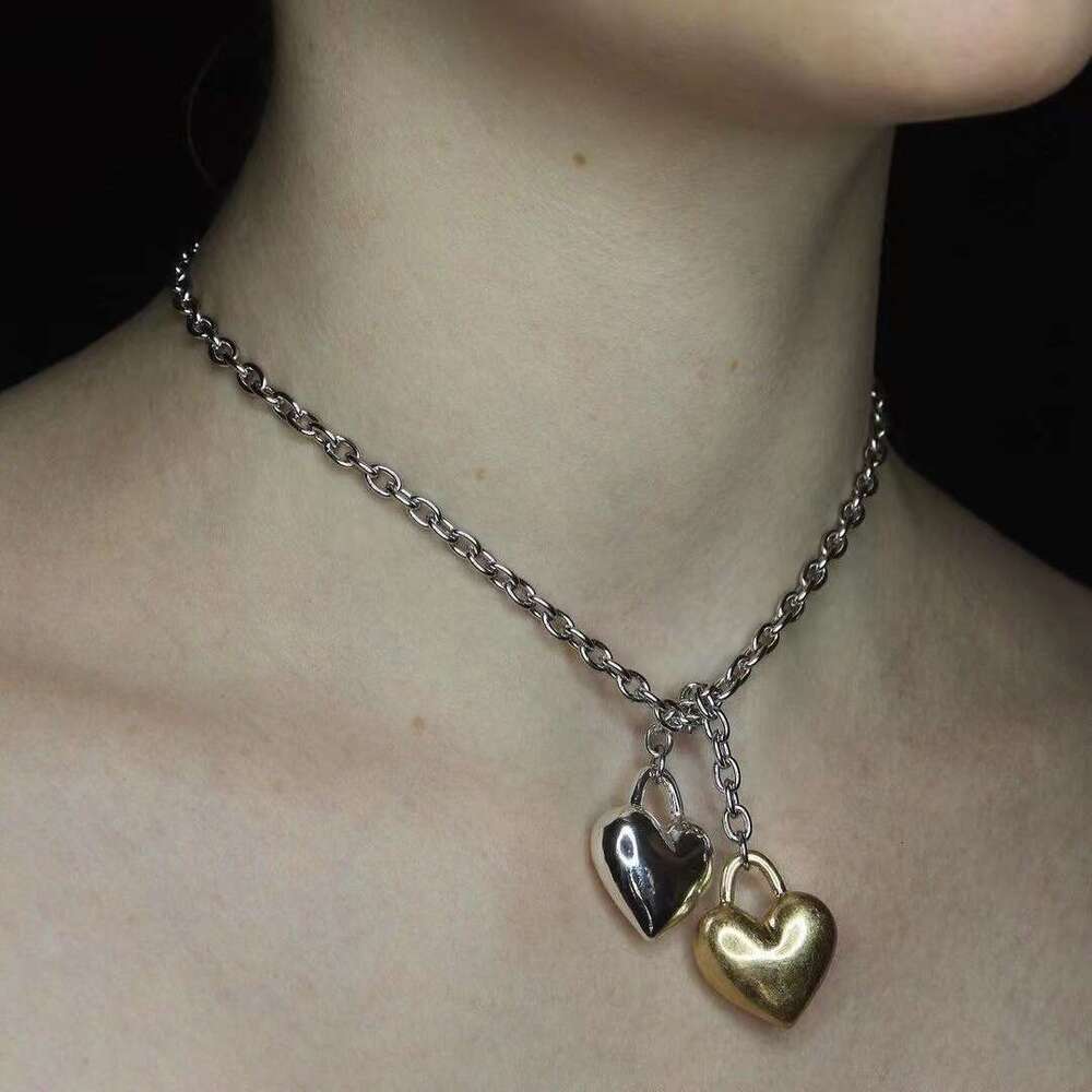 DHcollections Stylish Gold and Silver Exaggerated Heart - shaped Necklaces for Women. Copper - plated with real gold