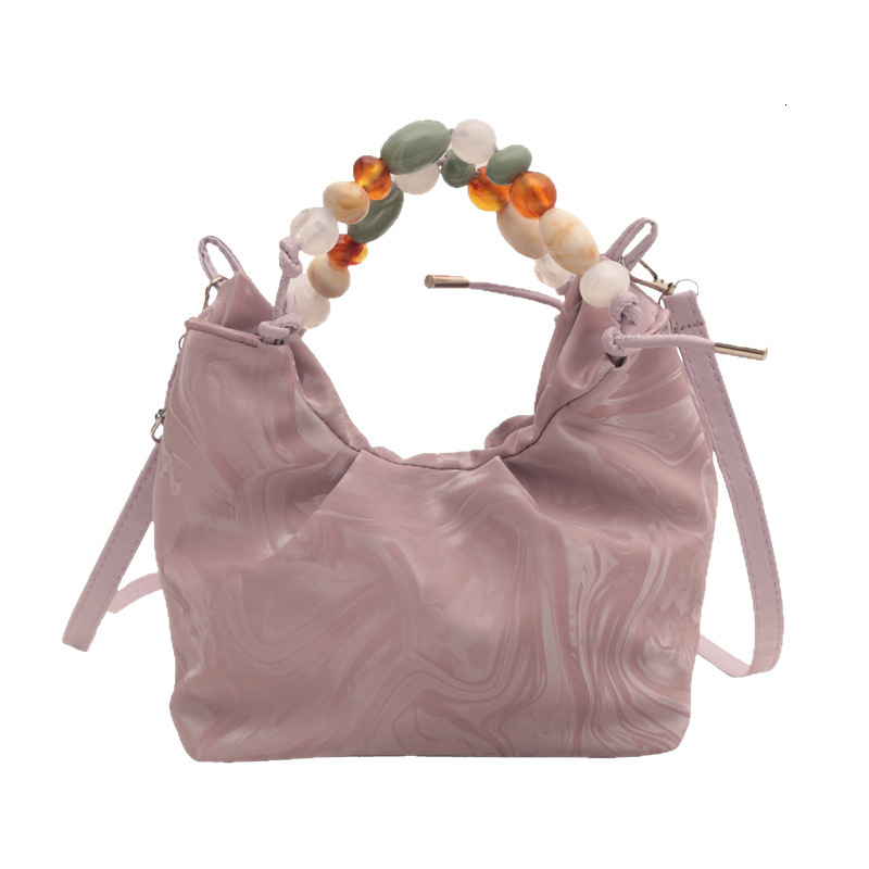 2025 autumn new women's handbag fashion versatile, light luxury elegant niche design bucket bag pearl crossbody bag designer shoulder bag