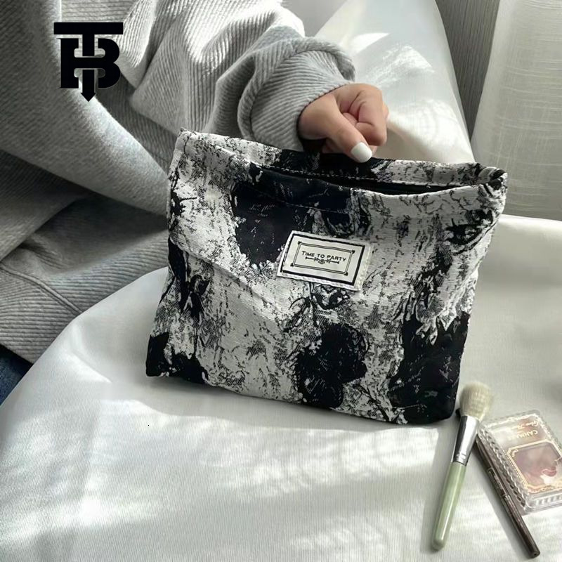 TB BHULAMTE Original Niche Design Black and White Elegant Jacquard Canvas Makeup Designer s bag Bag Artistic Retro Simple Elegant Floral Convenient Cl
