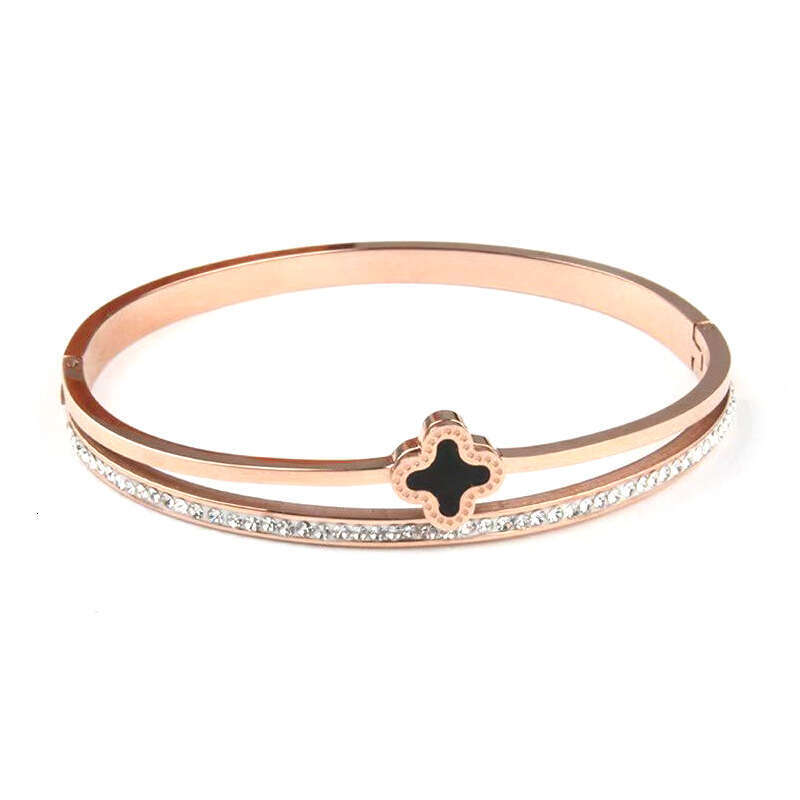 DH collections European - American Style Stainless Steel Single - row Diamond - inlaid Bracelet. This rose - gold four - leaf - clover titanium