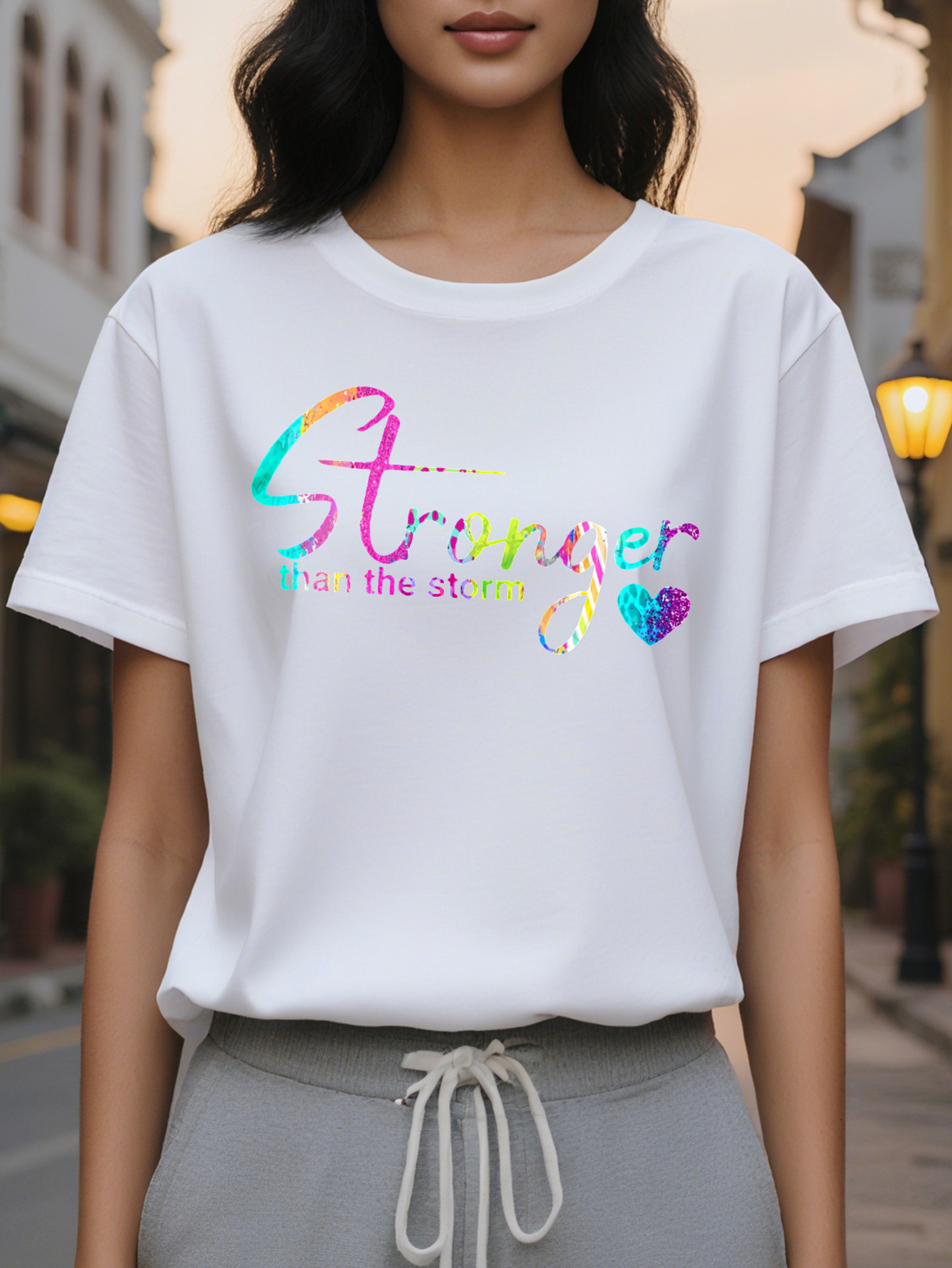 Large XL Women Stronger Than The Storm Graphic T-Shirt Vibrant Colorful Lettering Heart Design Casual Short Sleeve Crew Plus Size