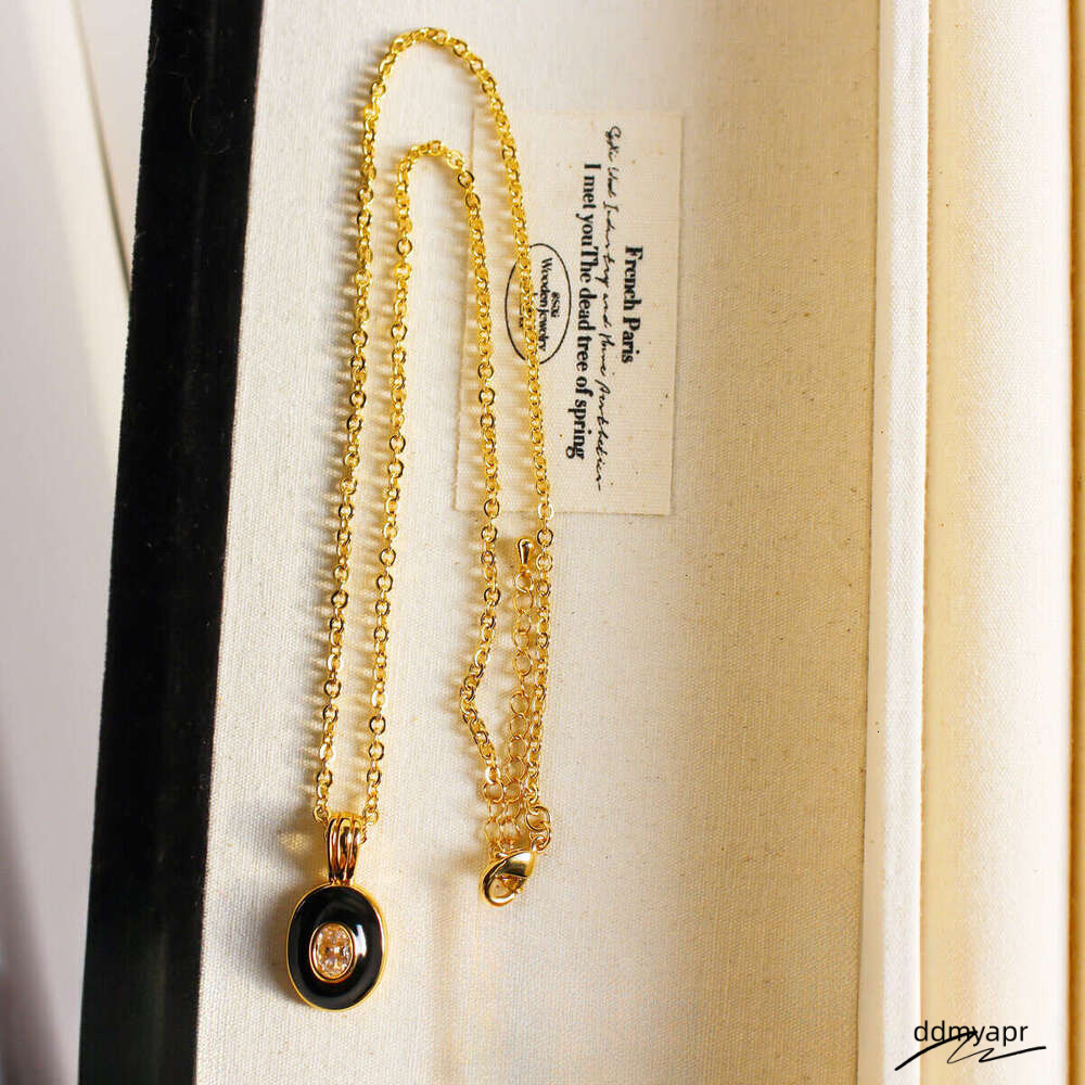 Niche High Quality Black Gold Enamel Glaze Oval Pendant Ddmyday Necklace Fashionable Zircon Layered Sweater Chain 762 Ddmyday