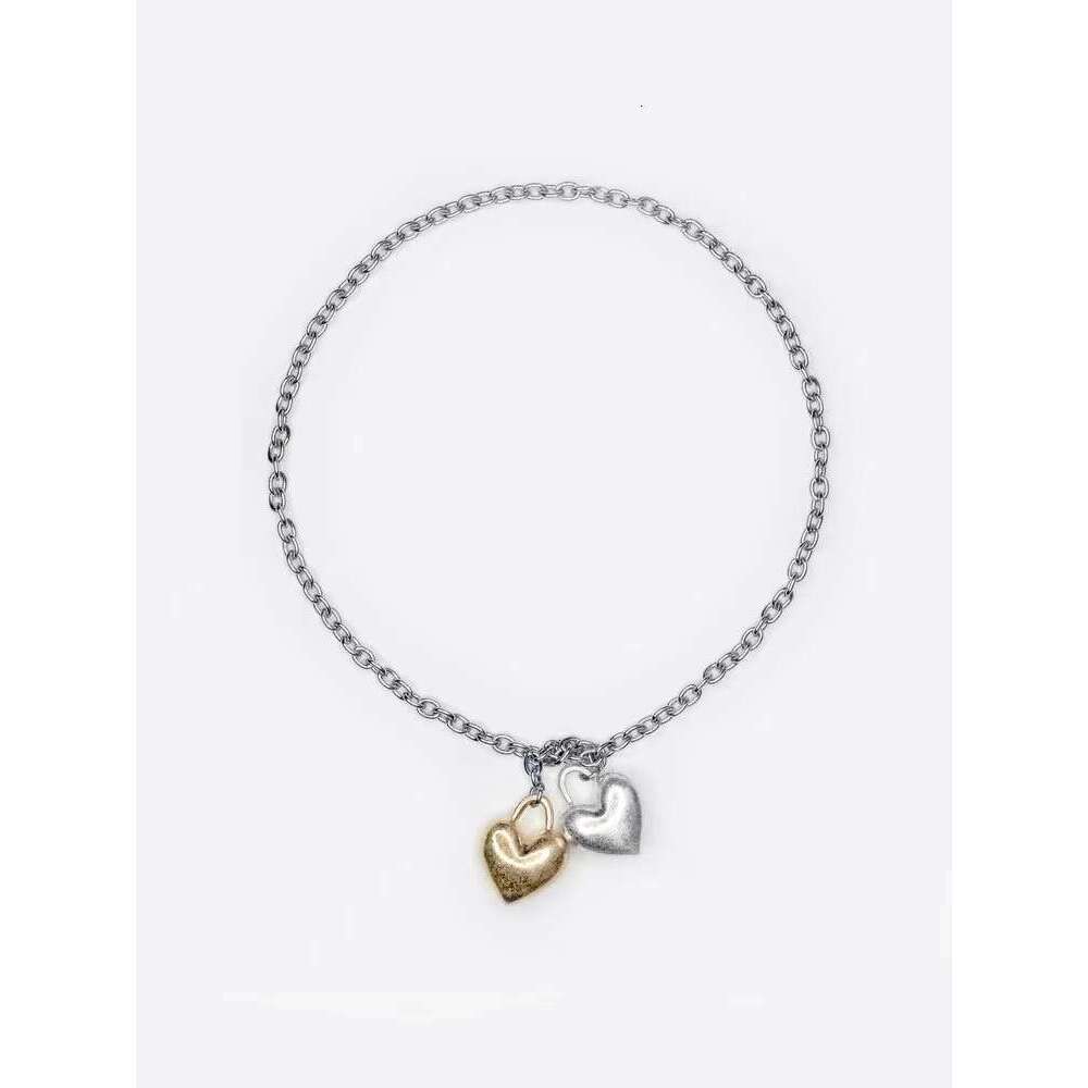 DHcollections Stylish Gold and Silver Exaggerated Heart - shaped Necklaces for Women. Copper - plated with real gold