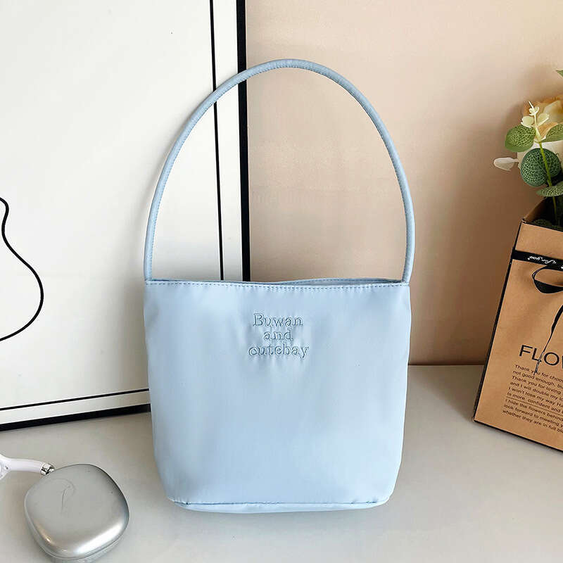 2025 Summer New Simple Nylon Underarm Korean Niche Design Letter Embroidery Handheld Commuter Bucket Bag