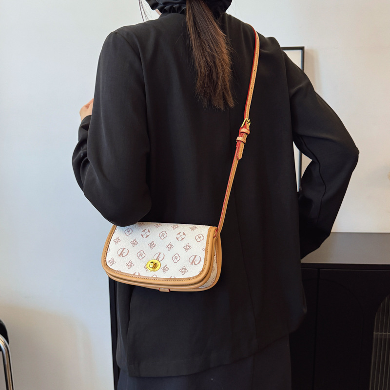 High-end bag for women 2025 new retro fashion temperament printed saddle bag temperament versatile shoulder messenger bag