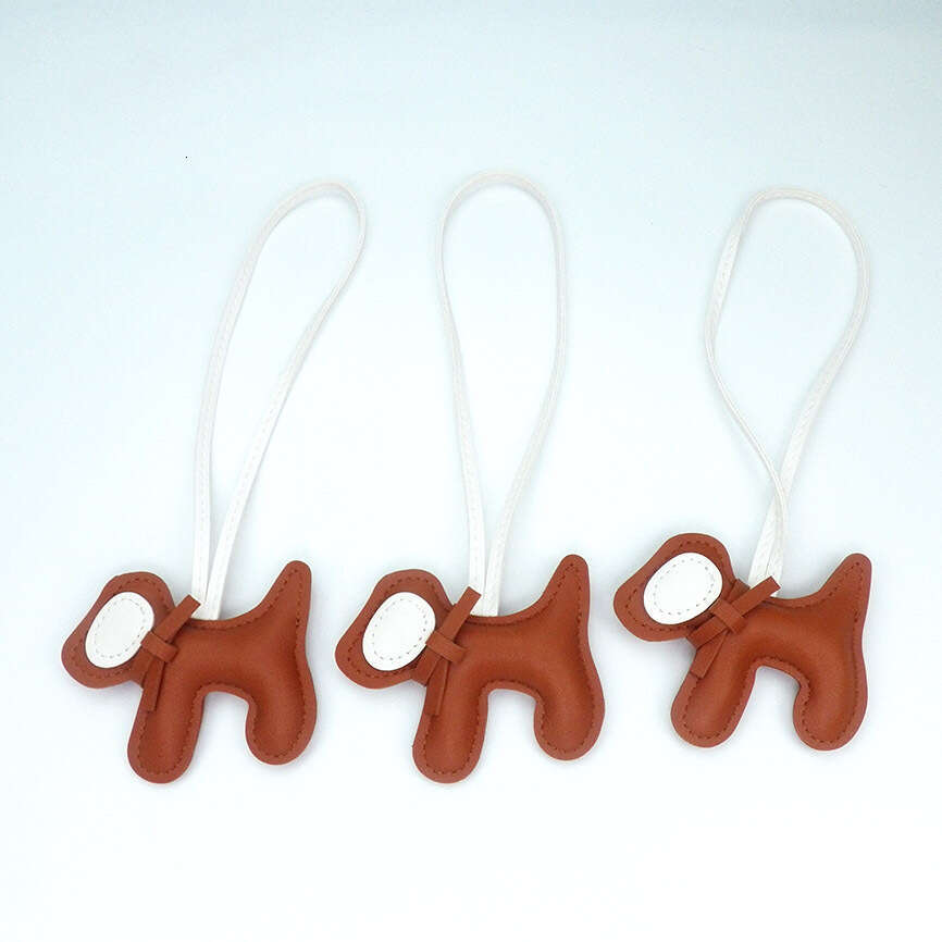 DHEssentials 2025 Spring Leather Bow Dog Pendant Cartoon Bag Charm PU Keychain Car Hanger White Customizable