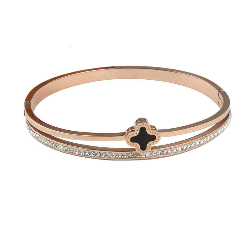DH collections European - American Style Stainless Steel Single - row Diamond - inlaid Bracelet. This rose - gold four - leaf - clover titanium