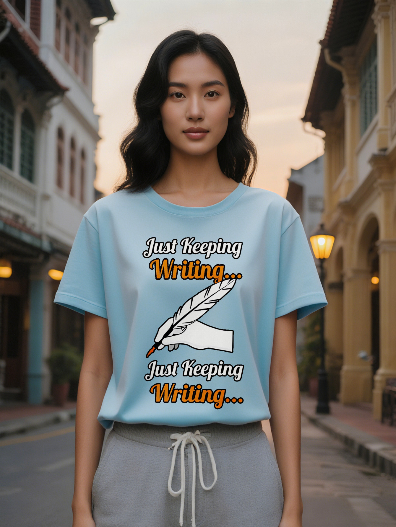 Large XL Women's Casual Short Sleeve T-Shirt Handwritten Feather Quill Just Keeping Writing Print Black with Orange Lettering Plus Size