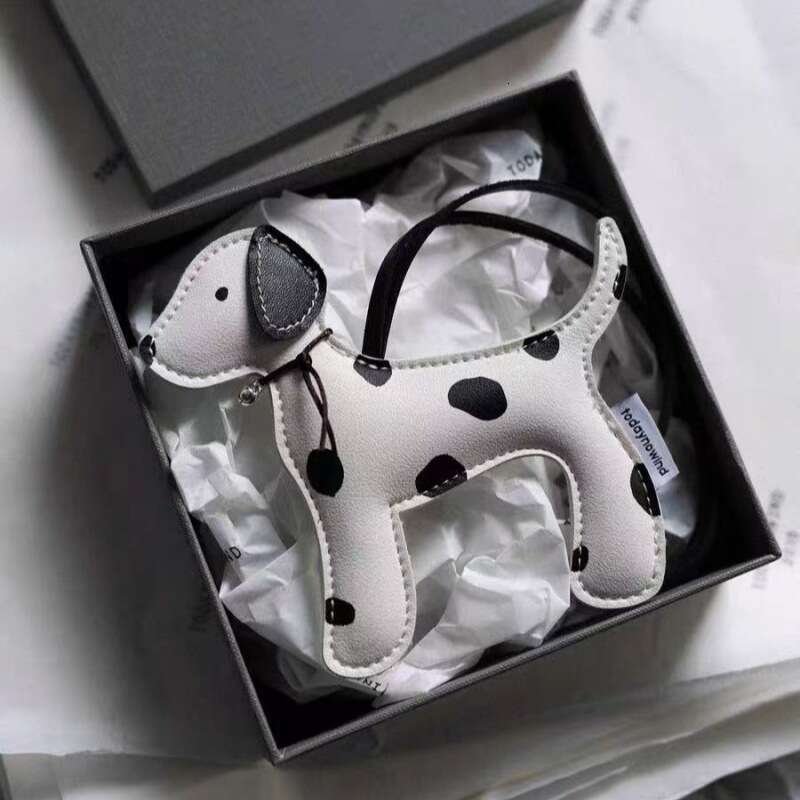 DHEssentials 2025 Spotted Pup Charm, PU Leather Dog Mascot, Cute Keychain Pendant