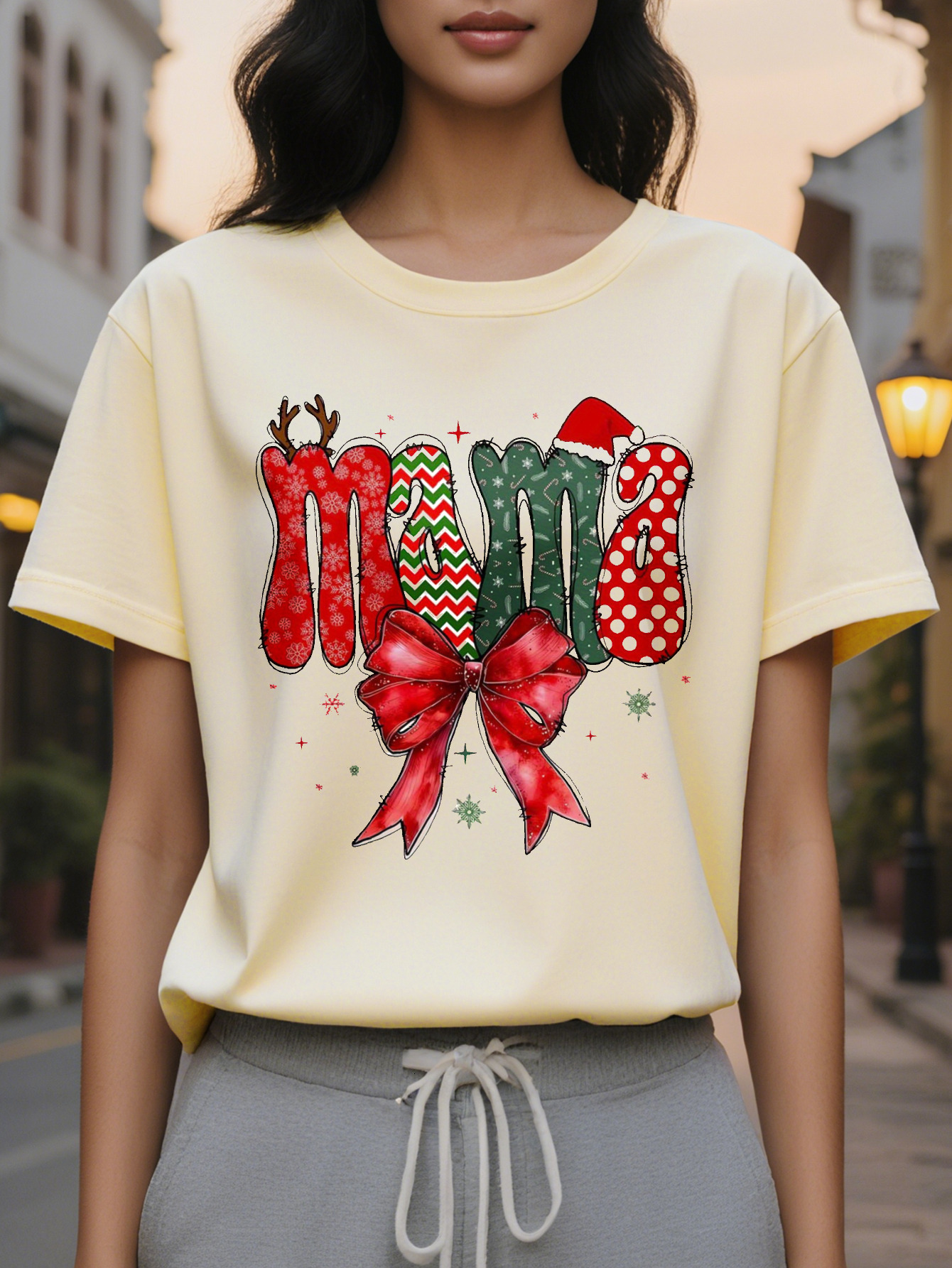 An elegant women's T-shirt with Mom Christmas letters, round neck, cotton knit, casual top for autumn and winter