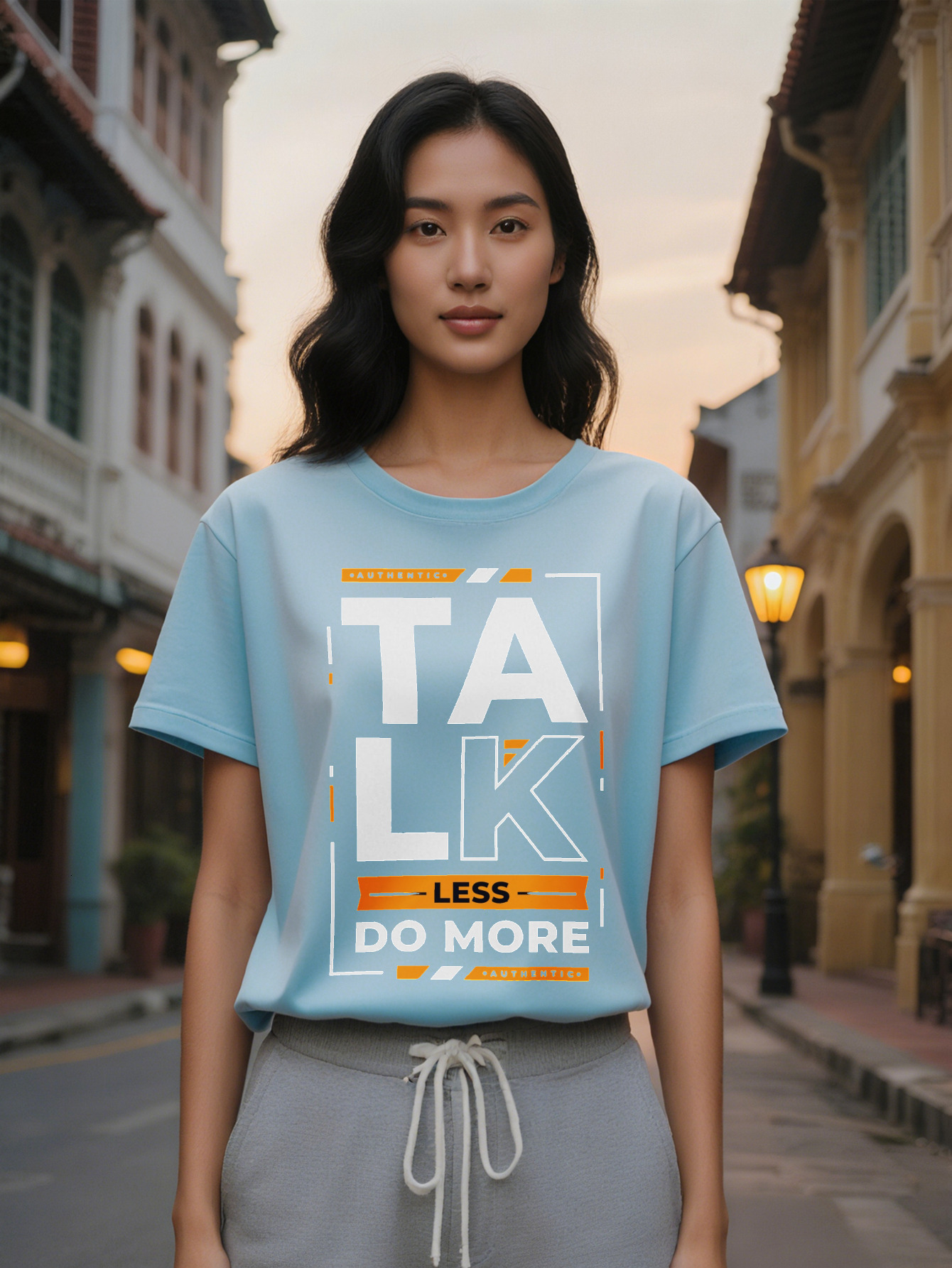 15% off Women's Casual Graphic T-Shirt Black Orange Geometric Print with Bold TALK LESS DO MORE Lettering Regular Fit