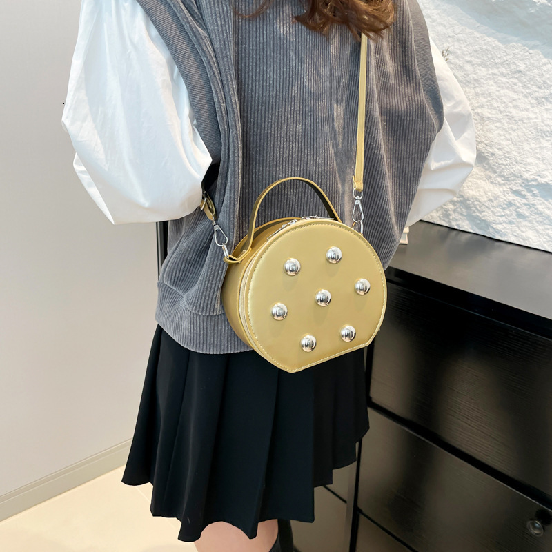 2025 autumn new fashion trend niche design casual simple versatile small round bag crossbody bag designer shoulder bag