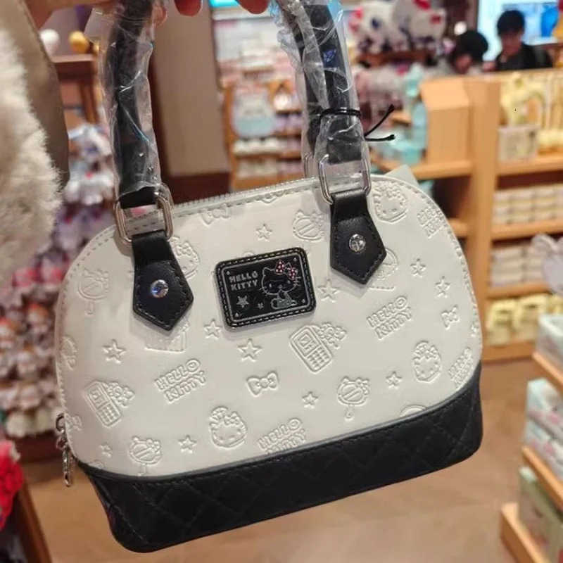 Sanrio Classic Sanrio Handbag Collection: Elegant Black/White Boston Messengers with Adjustable Straps