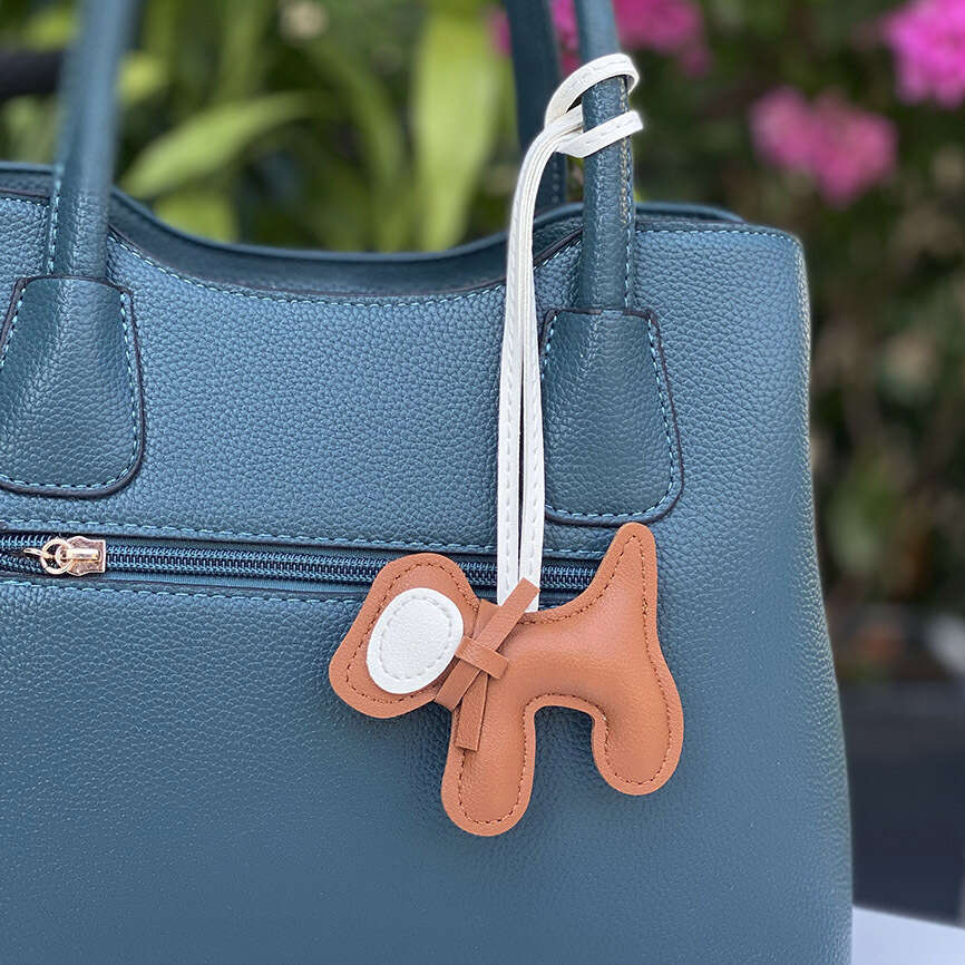 DHEssentials 2025 Spring Leather Bow Dog Pendant Cartoon Bag Charm PU Keychain Car Hanger White Customizable