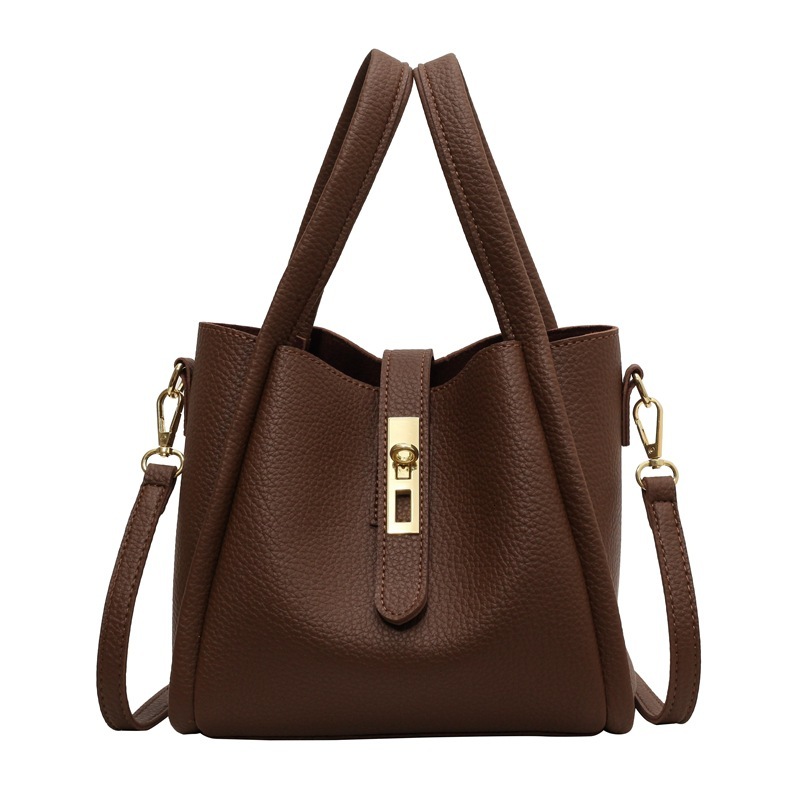 The 2025 new designer bag, a classic and fashionable large-capacity handbag with leather texture for travel, is available in black, white and brown