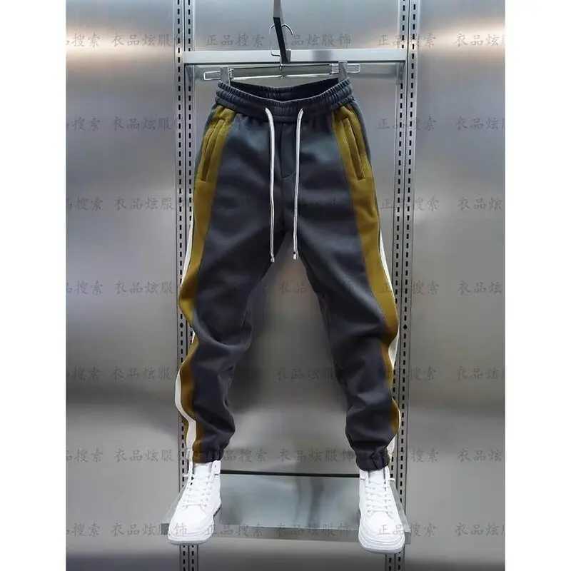 Man Sweatpant Striped Stitching Casual Harem Pants Jogger Trousers Luxury Brand Mens Clothing Elastic Waist Sweatpants MenXJ250904
