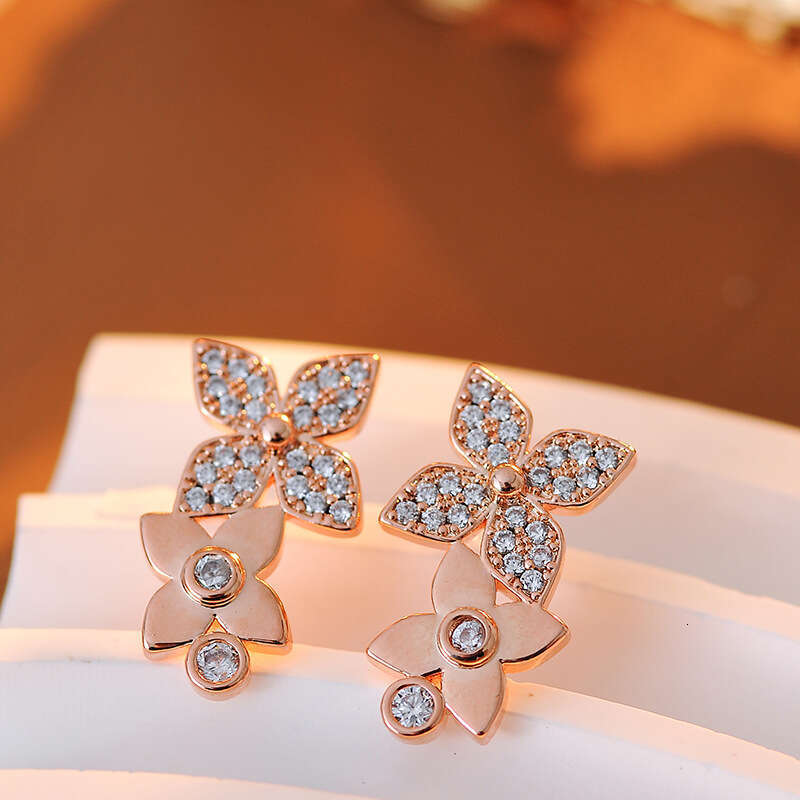 DH collections Korean - style S925 Silver - needle Flower Earrings with Full - set Diamonds. These luxurious, sweet - styled earrings with floral peta