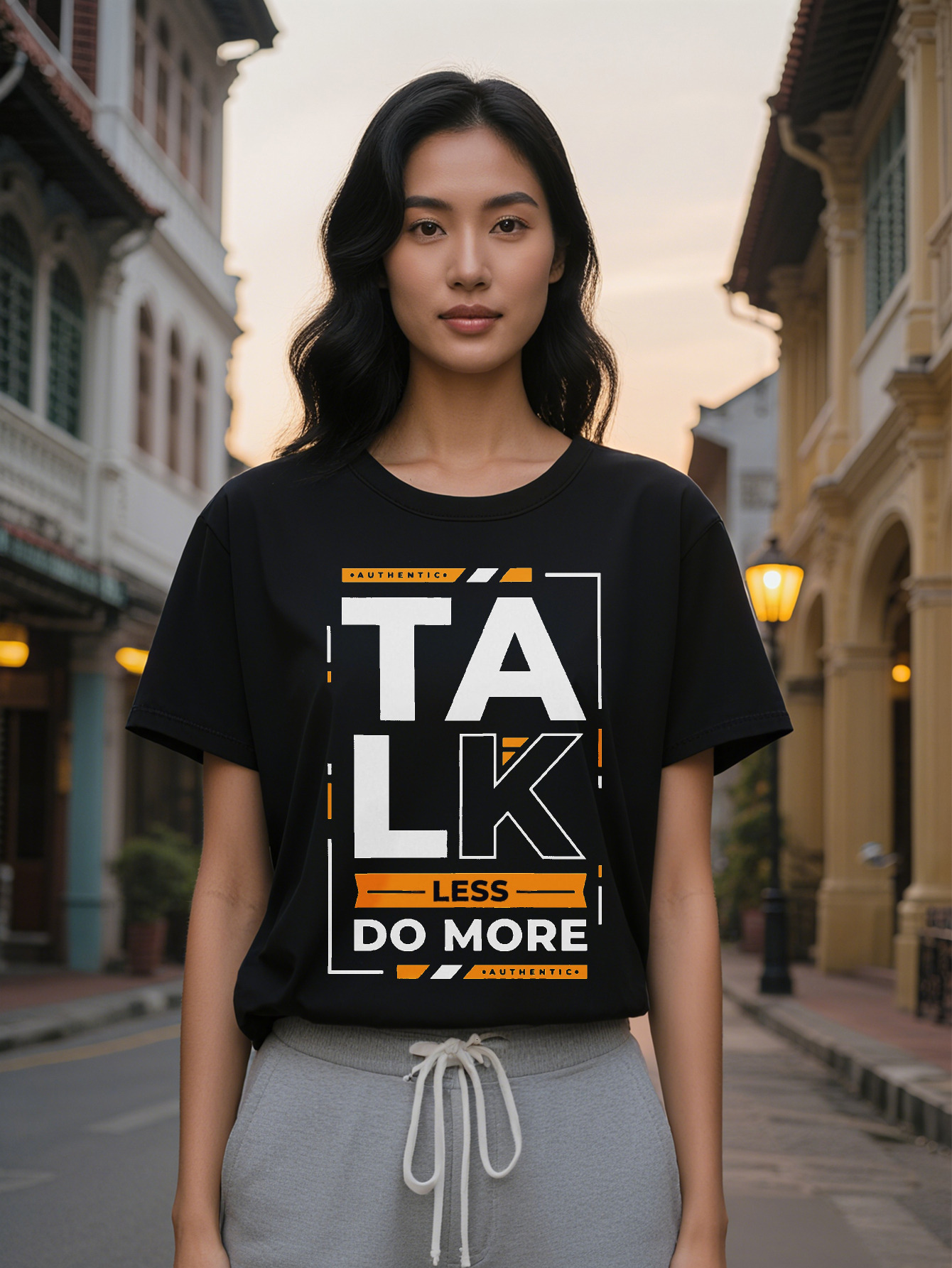 15% off Women's Casual Graphic T-Shirt Black Orange Geometric Print with Bold TALK LESS DO MORE Lettering Regular Fit
