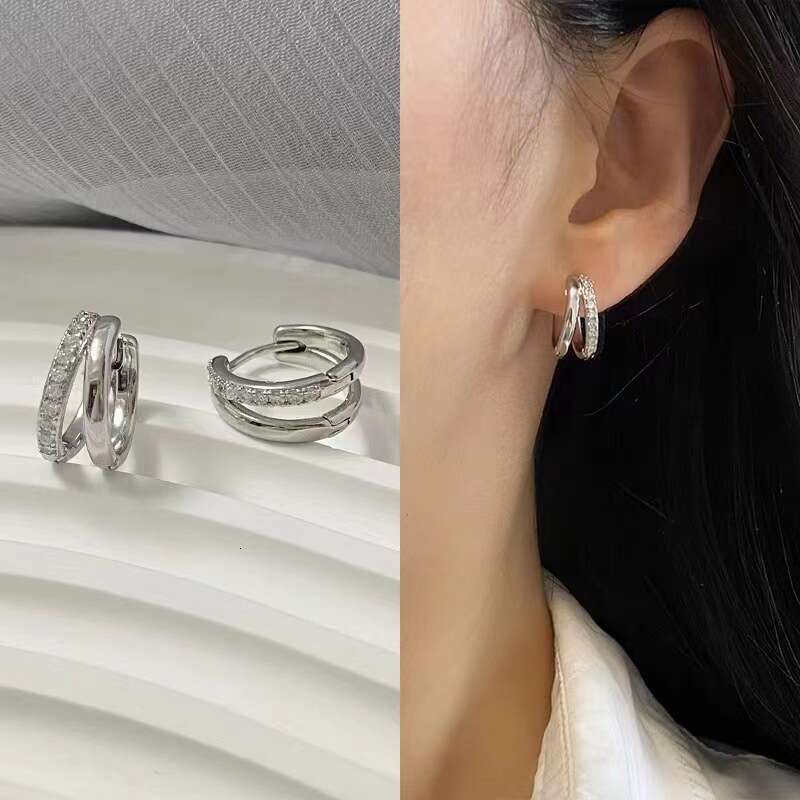 DH collections Stylish S999 Sterling Silver Double - layer Hollowed Ear Cuffs. These trendy Korean - style earrings feature a geometric design