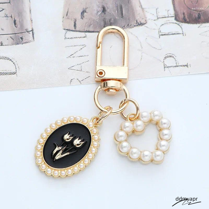 Keychains Bohemian Pearl Ddmyday Bow Rose Charm Keychain Jewelry For Women Trendy Tulip Love Letter Pendant Car Bag Keyring Accessories Ddmyday Ddmyda