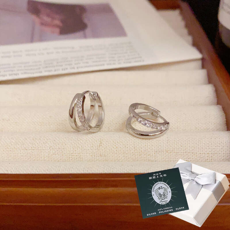 DH collections Stylish S999 Sterling Silver Double - layer Hollowed Ear Cuffs. These trendy Korean - style earrings feature a geometric design