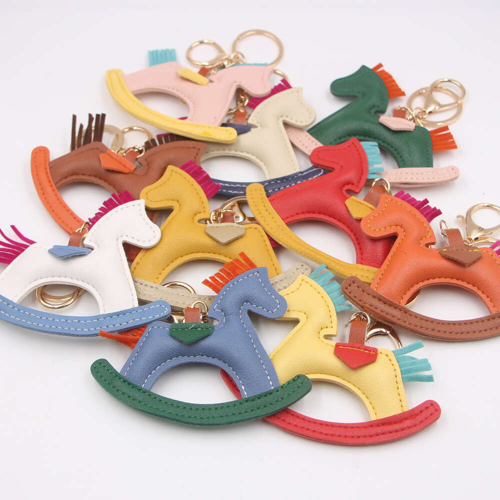 DHEssentials Creative Rocking Horse Keychain Leather Stuffed Car Pendant Backpack Charm Rotating Horse Ornament Multi-Color