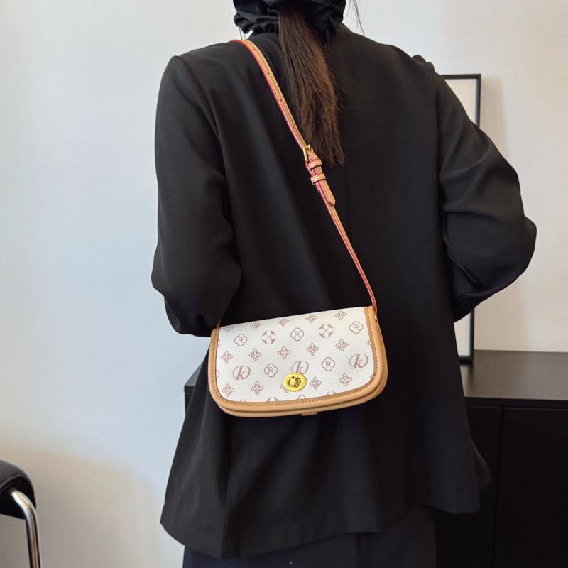 High-end bag for women 2025 new retro fashion temperament printed saddle bag temperament versatile shoulder messenger bag