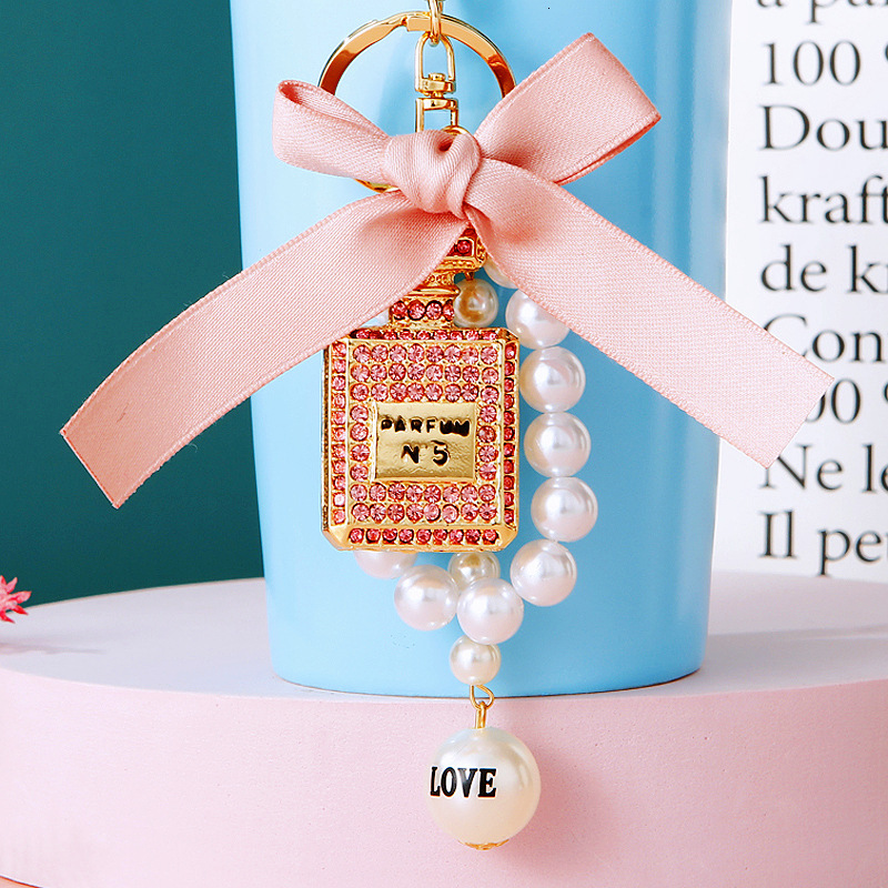 keychain pearl perfume bottle bowknot car for women cute creative bag pendant keychain ring with Inlaid diamonds gift mini bag keychain