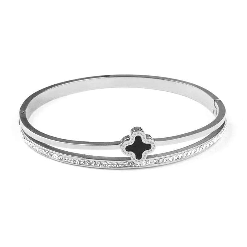 DH collections European - American Style Stainless Steel Single - row Diamond - inlaid Bracelet. This rose - gold four - leaf - clover titanium