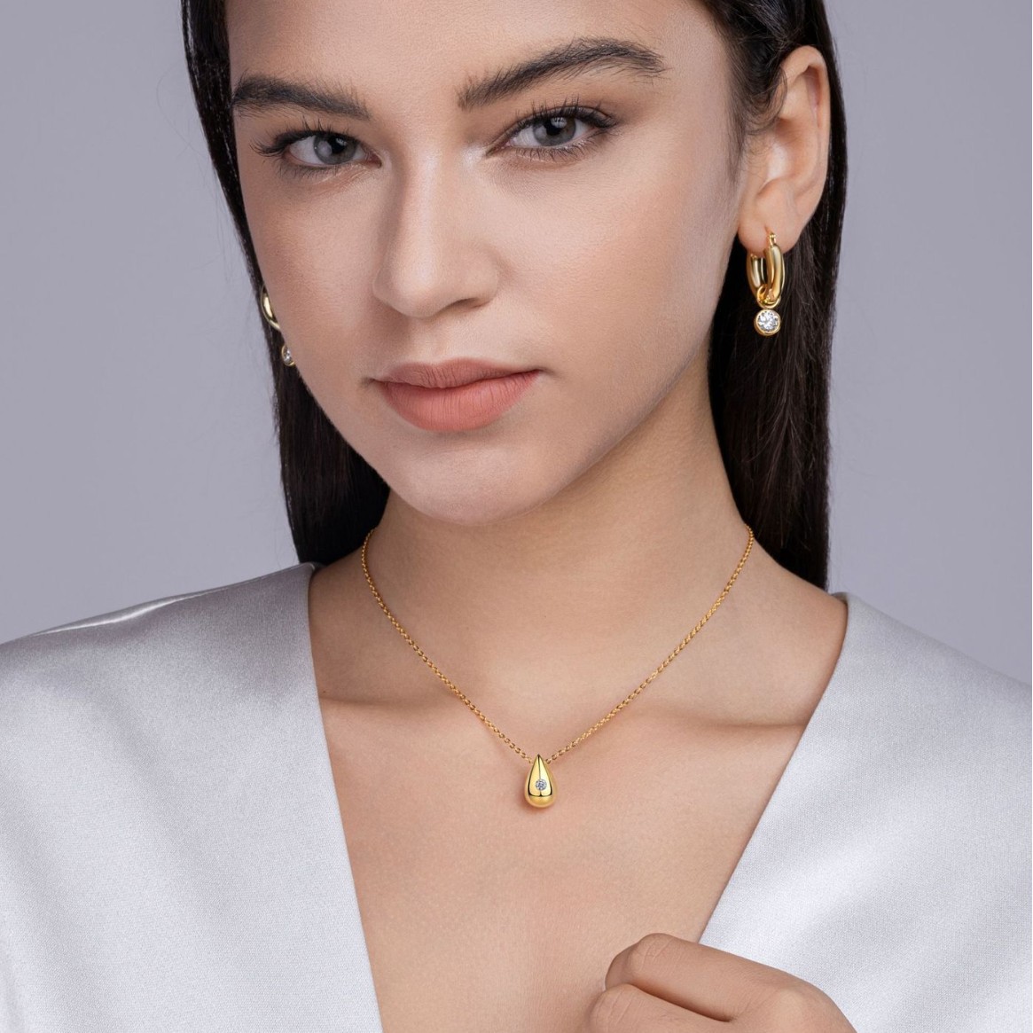 Timelessly Chic 'Tear of a Goddess' Pendent Necklace Adorned by Radiant Moissanites & Coated in Lustrous 18 Karat Yellow Gold