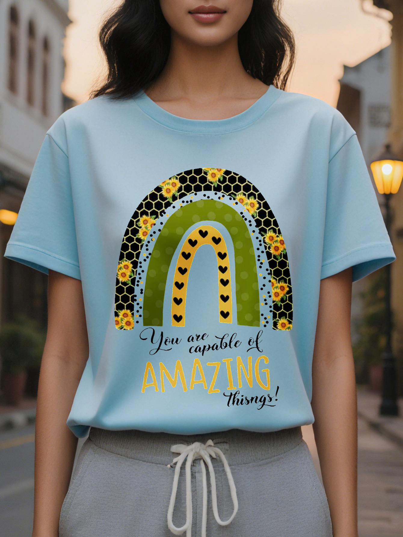 Women's T-shirt with design 'You Have the Ability to Do Amazing Things', featuring a rainbow floral pattern, round neck, and autumn sle