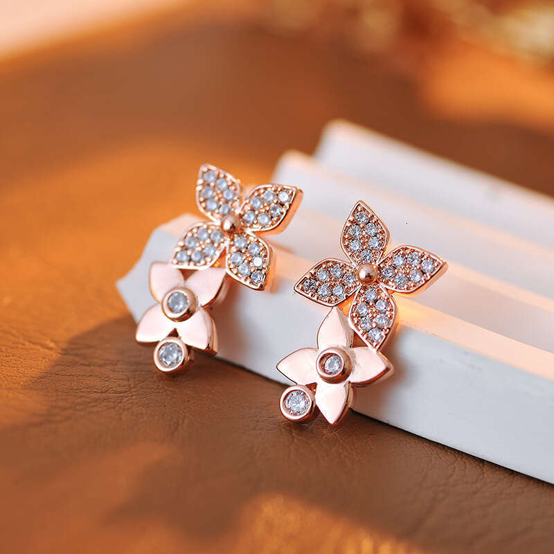 DH collections Korean - style S925 Silver - needle Flower Earrings with Full - set Diamonds. These luxurious, sweet - styled earrings with floral peta