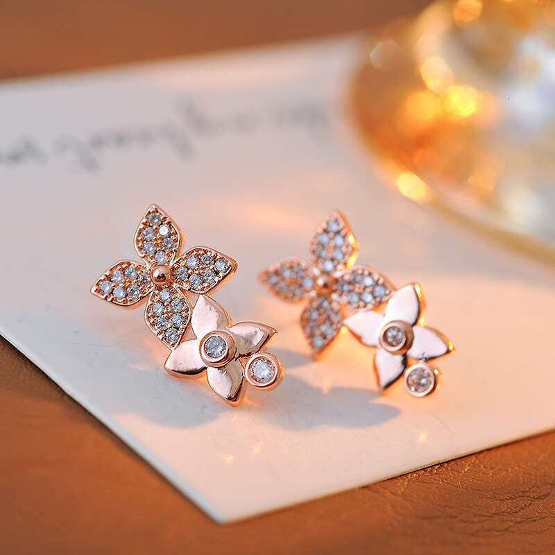 DH collections Korean - style S925 Silver - needle Flower Earrings with Full - set Diamonds. These luxurious, sweet - styled earrings with floral peta