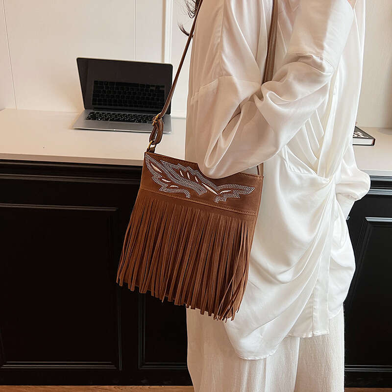 Ethnic Style Single Shoulder Women's Niche High-end Tassel Embroidery Leather Small Square Outdoor Travel Atmosphere Crossbody Bag