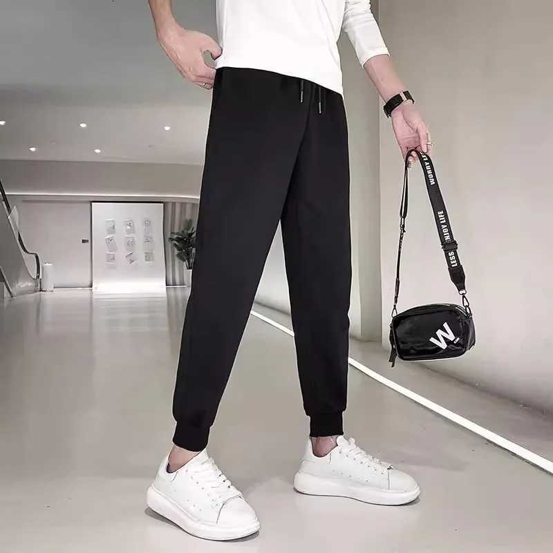 Autumn sweatpants mens casual pants mens handsome Korean version narrow tube tight pants sports youth thin long pants mens trXJ250904