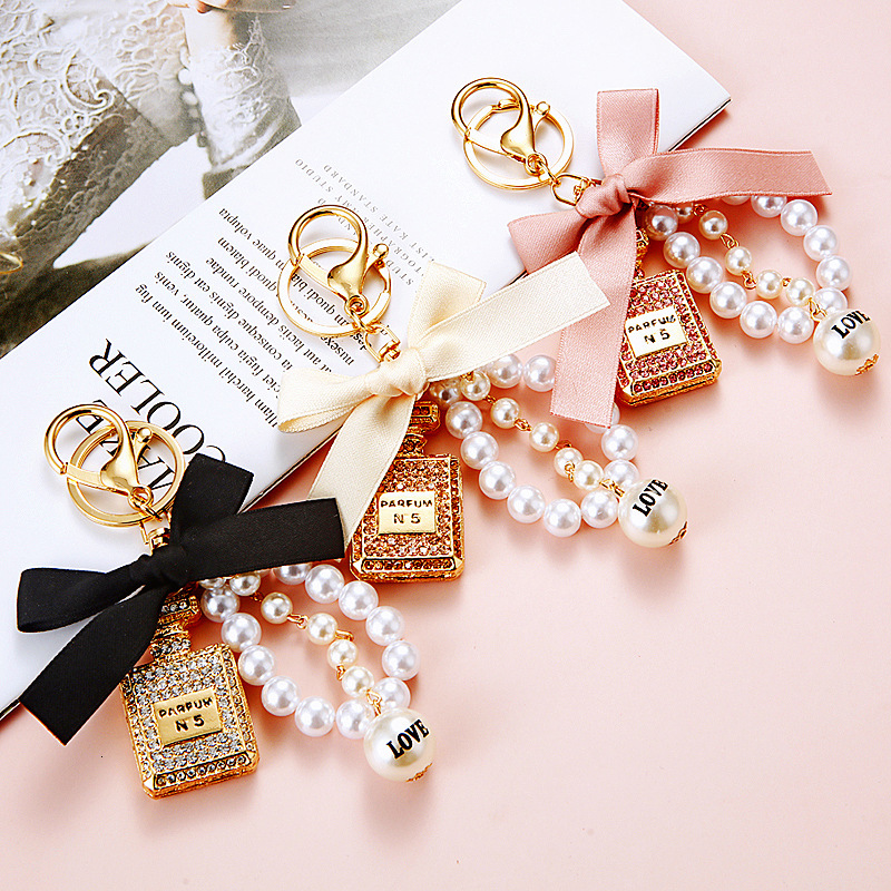keychain pearl perfume bottle bowknot car for women cute creative bag pendant keychain ring with Inlaid diamonds gift mini bag keychain