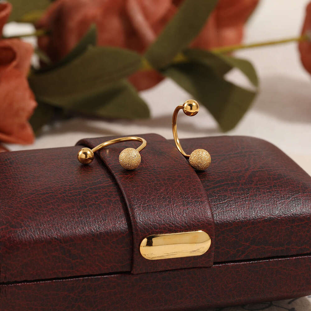 Korean Style Niche Minimalist Ins New Matte Bead U-Shaped Ear Bone Stud Fashion Personality Twist Screw Titanium Steel Earrings