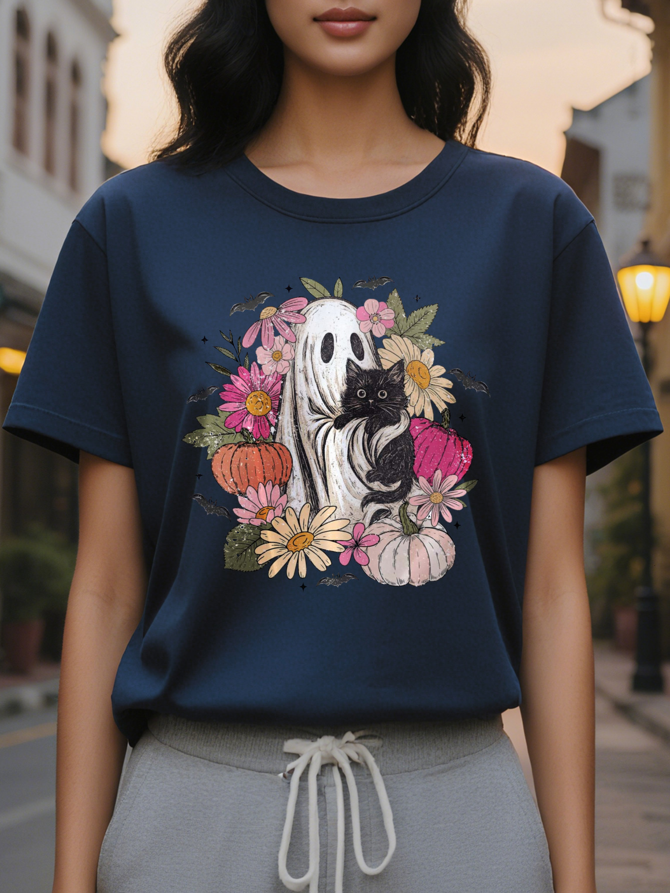 Women s elegant white short sleeved T shirt with black cat flower bat print, round neck summer top in soft pale pink and green