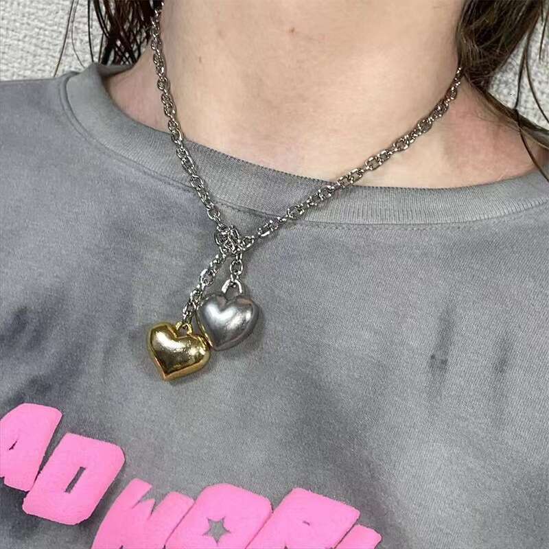 DHcollections Stylish Gold and Silver Exaggerated Heart - shaped Necklaces for Women. Copper - plated with real gold