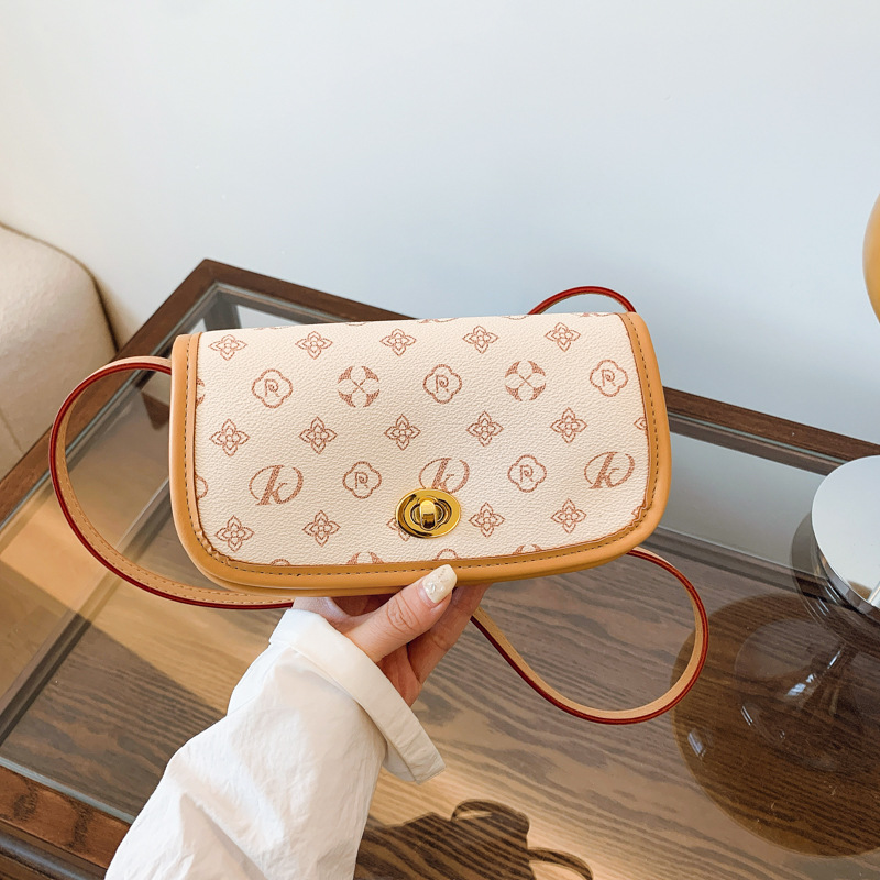 High-end bag for women 2025 new retro fashion temperament printed saddle bag temperament versatile shoulder messenger bag