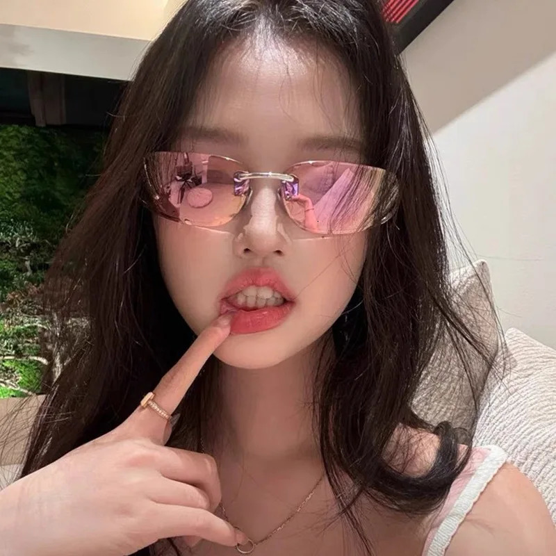 Oval rimless sunglasses Y2K premium sense European and American concave shape sunglasses retro sunglasses women 250903