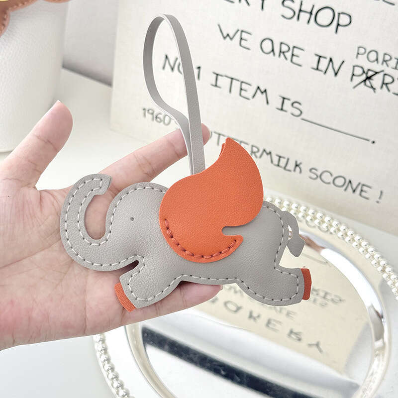 DHEssentials 2025 Handmade Flying Elephant Pendant DIY Bag Charm Leather Hand Sewn Keychain Exquisite Gift Car Hanger Coffee Blue Beige Gray