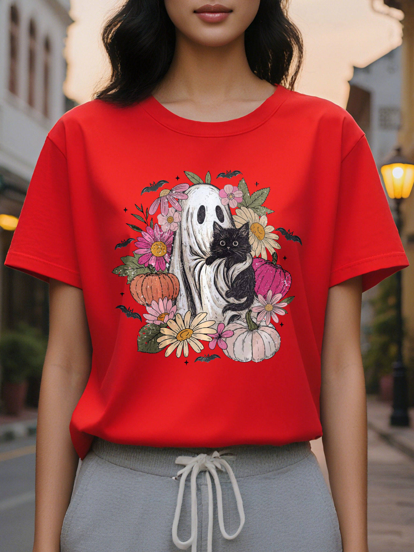 Women s elegant white short sleeved T shirt with black cat flower bat print, round neck summer top in soft pale pink and green